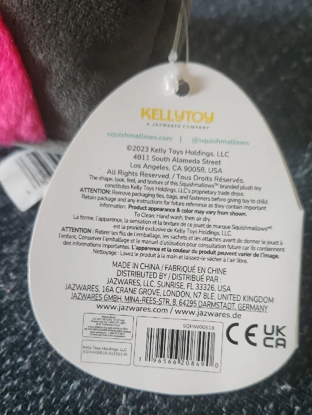 Squishmallows Gray Plush Cat Toy with Bright Pink Accents